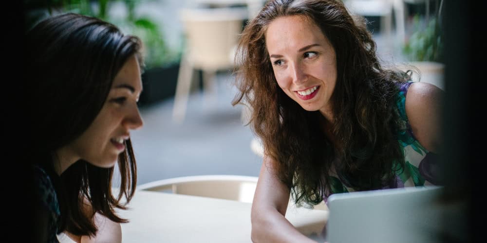 Two women engaged in conversation