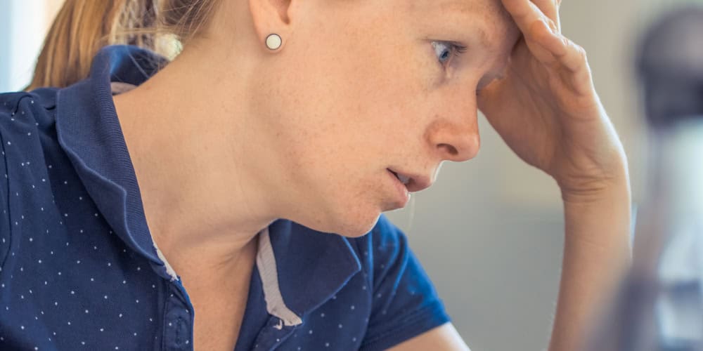 Frustrated person at computer to accompany blog: Is it time to change your 360 supplier?