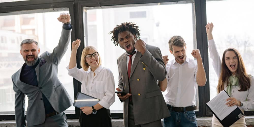 Group of successful people to accompany blog article: Reskill to retain – and shift skills management to the employee