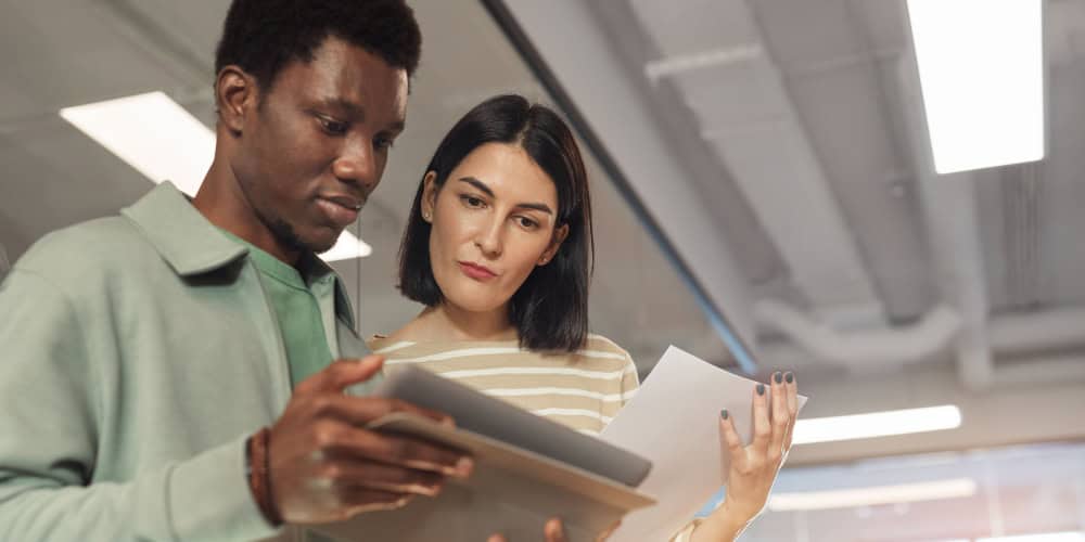 Two engaged people at work to accompany blo article: Talent Consumerisation – what does it mean for employee engagement?